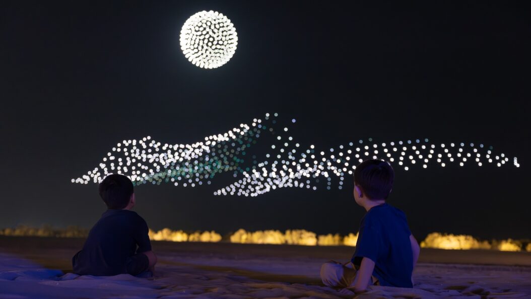 Manar Abu Dhabi 2025 Tracing Light Across a Moving Desert: Manar Abu Dhabi 2025 Image © Image courtesy of Department of Culture and Tourism Abu Dhabi & Public Art Abu Dhabi Iregular - " As Water Falls Encor Studio - " Alcove Ltd" KAWS - " Holiday Abu Dhabi" Maitha Hamdan - "Breath of the Same Place" Shaikha Al Mazrou - "Contingent Object" Lachlan Turczan - "Veil I" DRIFT - "Whispers" Ezequiel Pini (A.K.A. SIX N. FIVE) - "Skyward" DRIFT - "Unfold" DRIFT - "Wind of Change" Designooor Hamed Mahzoon