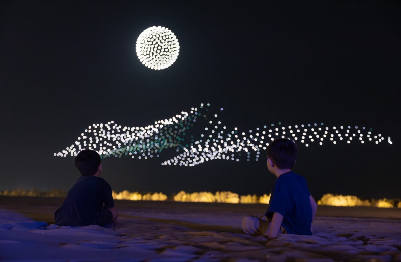 Manar Abu Dhabi 2025 Tracing Light Across a Moving Desert: Manar Abu Dhabi 2025 Image © Image courtesy of Department of Culture and Tourism Abu Dhabi & Public Art Abu Dhabi Iregular - " As Water Falls Encor Studio - " Alcove Ltd" KAWS - " Holiday Abu Dhabi" Maitha Hamdan - "Breath of the Same Place" Shaikha Al Mazrou - "Contingent Object" Lachlan Turczan - "Veil I" DRIFT - "Whispers" Ezequiel Pini (A.K.A. SIX N. FIVE) - "Skyward" DRIFT - "Unfold" DRIFT - "Wind of Change" Designooor Hamed Mahzoon