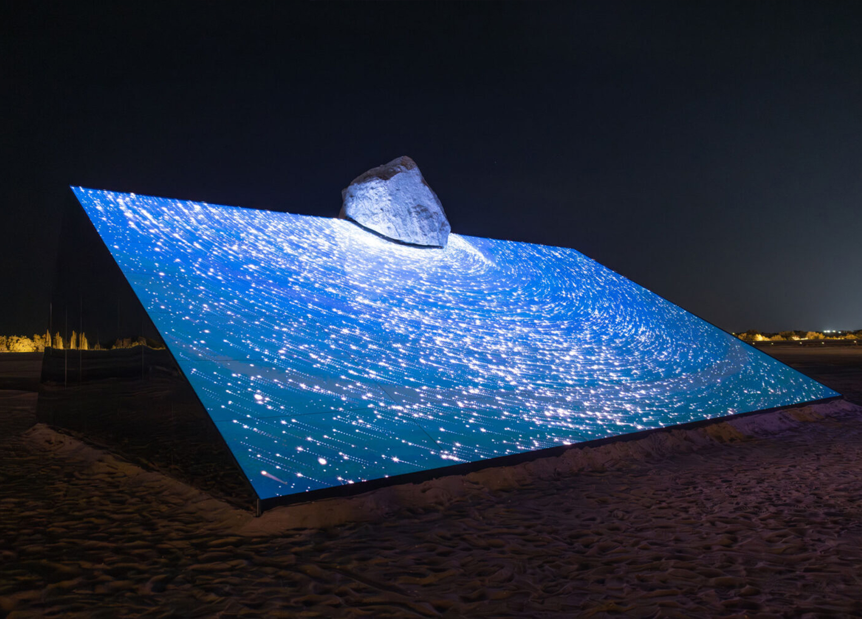 Manar Abu Dhabi 2025Tracing Light Across a Moving Desert: Manar Abu Dhabi 2025
Image © Image courtesy of Department of Culture and Tourism Abu Dhabi & Public Art Abu Dhabi
Iregular - " As Water Falls
Encor Studio - " Alcove Ltd"
KAWS - " Holiday Abu Dhabi"
Maitha Hamdan - "Breath of the Same Place"
Shaikha Al Mazrou - "Contingent Object"
Lachlan Turczan - "Veil I"
DRIFT - "Whispers"
Ezequiel Pini (A.K.A. SIX N. FIVE) - "Skyward"
DRIFT - "Unfold"
DRIFT - "Wind of Change"
Designooor
Hamed Mahzoon