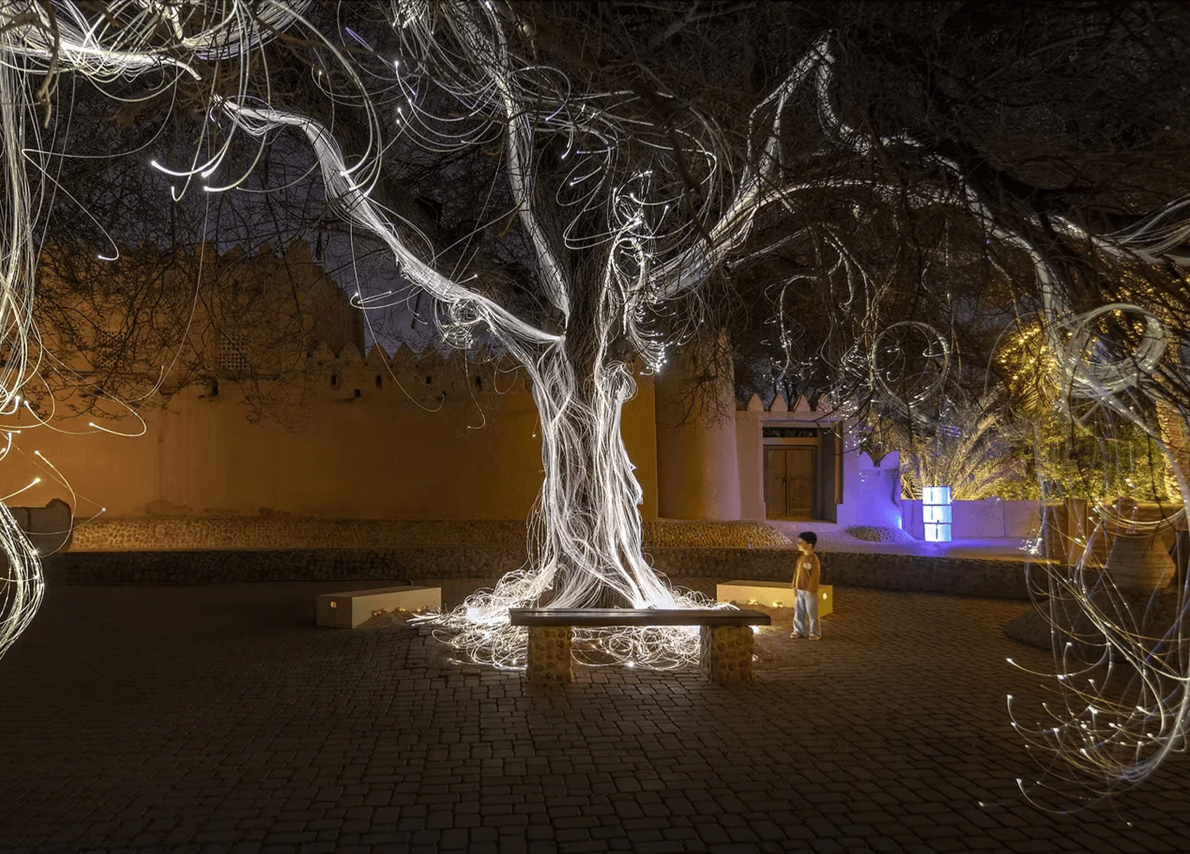 Manar Abu Dhabi 2025Tracing Light Across a Moving Desert: Manar Abu Dhabi 2025
Image © Image courtesy of Department of Culture and Tourism Abu Dhabi & Public Art Abu Dhabi
Iregular - " As Water Falls
Encor Studio - " Alcove Ltd"
KAWS - " Holiday Abu Dhabi"
Maitha Hamdan - "Breath of the Same Place"
Shaikha Al Mazrou - "Contingent Object"
Lachlan Turczan - "Veil I"
DRIFT - "Whispers"
Ezequiel Pini (A.K.A. SIX N. FIVE) - "Skyward"
DRIFT - "Unfold"
DRIFT - "Wind of Change"
Designooor
Hamed Mahzoon