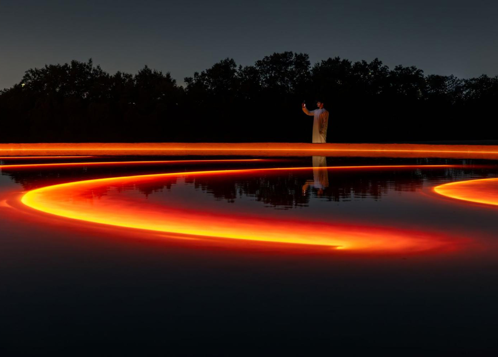 Manar Abu Dhabi 2025Tracing Light Across a Moving Desert: Manar Abu Dhabi 2025
Image © Image courtesy of Department of Culture and Tourism Abu Dhabi & Public Art Abu Dhabi
Iregular - " As Water Falls
Encor Studio - " Alcove Ltd"
KAWS - " Holiday Abu Dhabi"
Maitha Hamdan - "Breath of the Same Place"
Shaikha Al Mazrou - "Contingent Object"
Lachlan Turczan - "Veil I"
DRIFT - "Whispers"
Ezequiel Pini (A.K.A. SIX N. FIVE) - "Skyward"
DRIFT - "Unfold"
DRIFT - "Wind of Change"
Designooor
Hamed Mahzoon