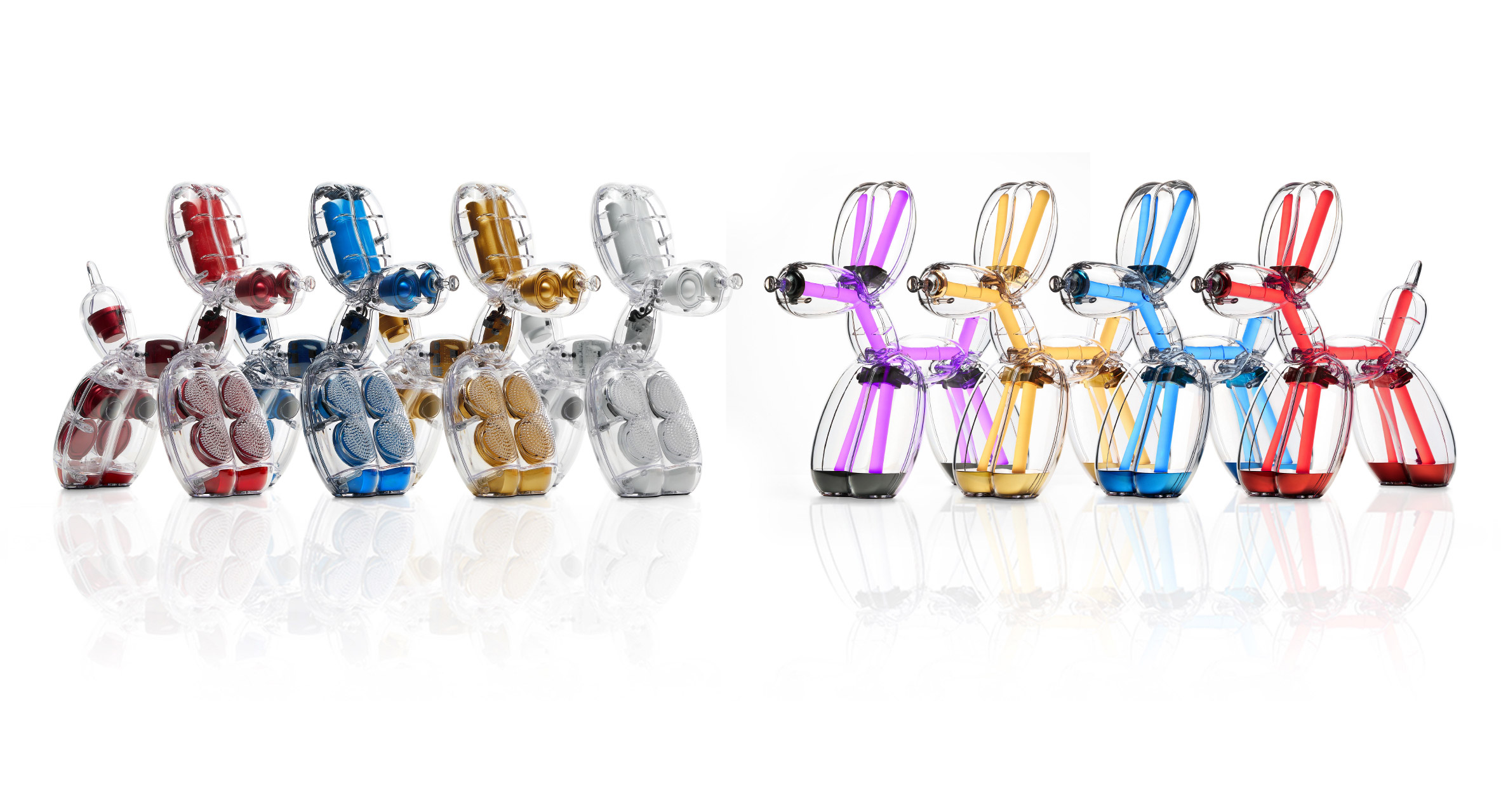 Illuminated Balloon Dog Lamp Chromatic in transparent gold polycarbonate, featuring integrated LED lighting and reflective sculptural form. Official Jeff Koons x Lexon collaboration, presented by Designooor Media and Academy. Written and edited by Hamed Mahzoon 